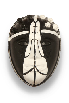 white prayer hands on a black mask