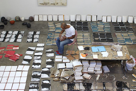 samuel levi working in an art studio