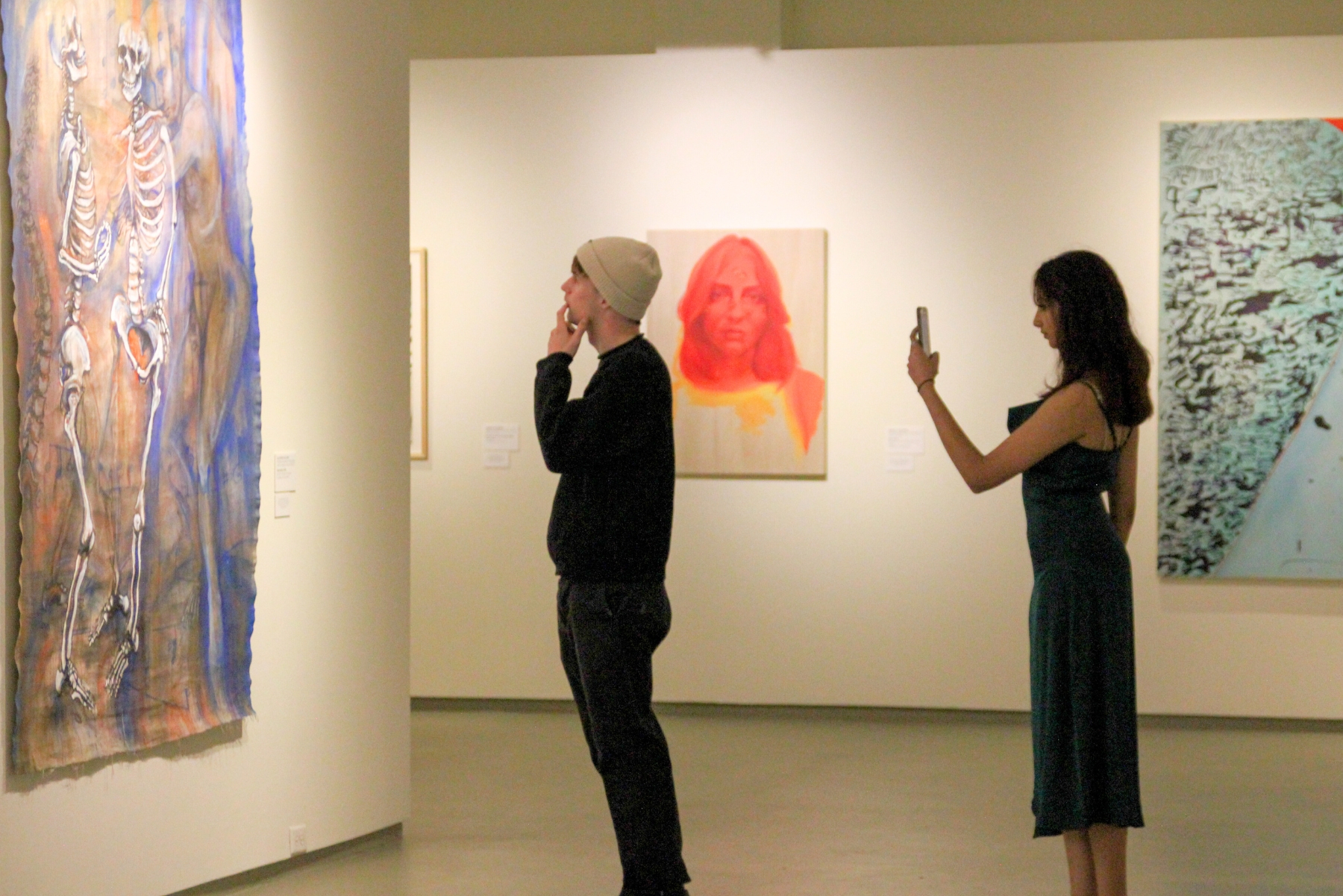 Teens enjoying an art gallery