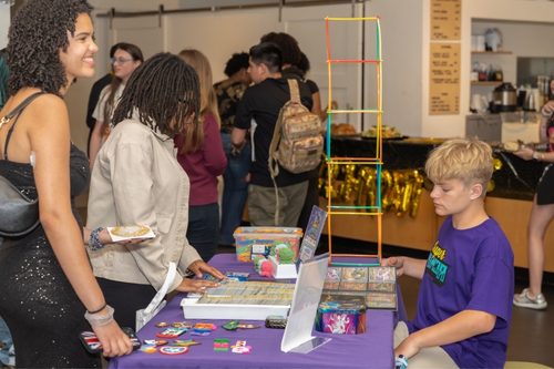 Teens exploring the "Teen Vendor Alley" at Lights in Time