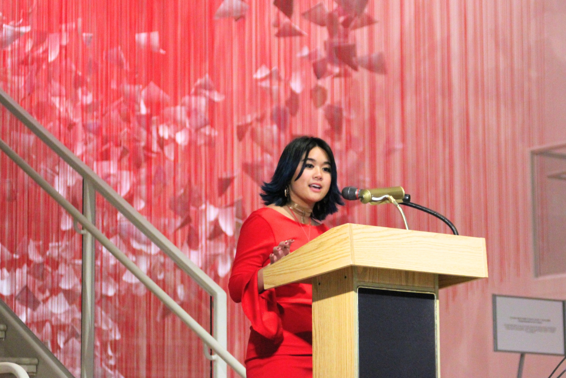 Teen speaking at an event