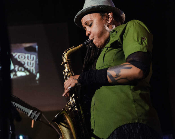 matana roberts playing saxophone