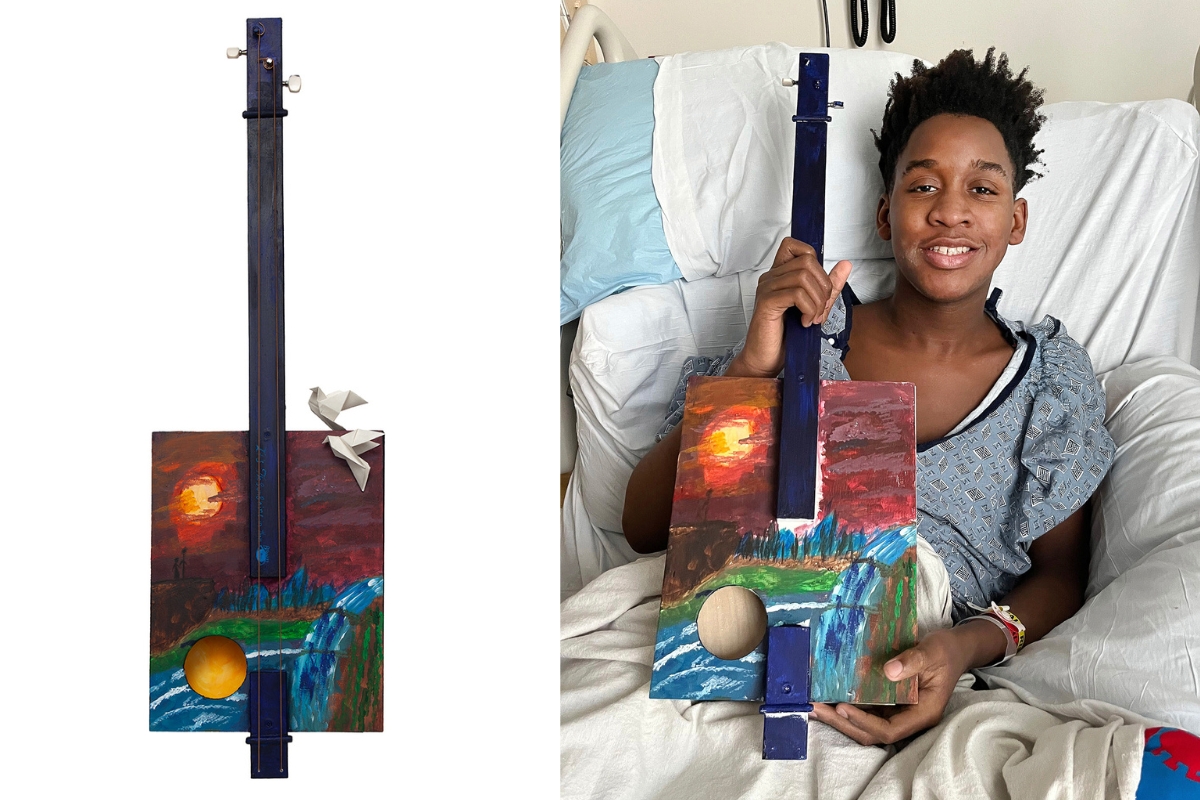 Art with a Heart patient Xavier with his work