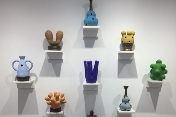 eight colorful ceramic sculptures