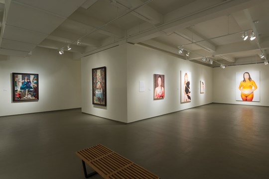 view of five pieces of artwork in the Get Real exhibit