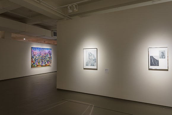 three pieces of artwork in the Micro-Macro exhibition