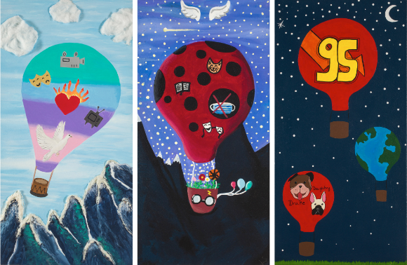 three canvases with a different air balloon design
