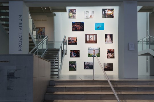 photographs hanging in the atrium