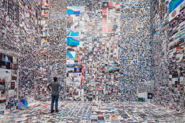 artwork by Evan Roth featuring the Atrium gallery walls covered in thousands of photos