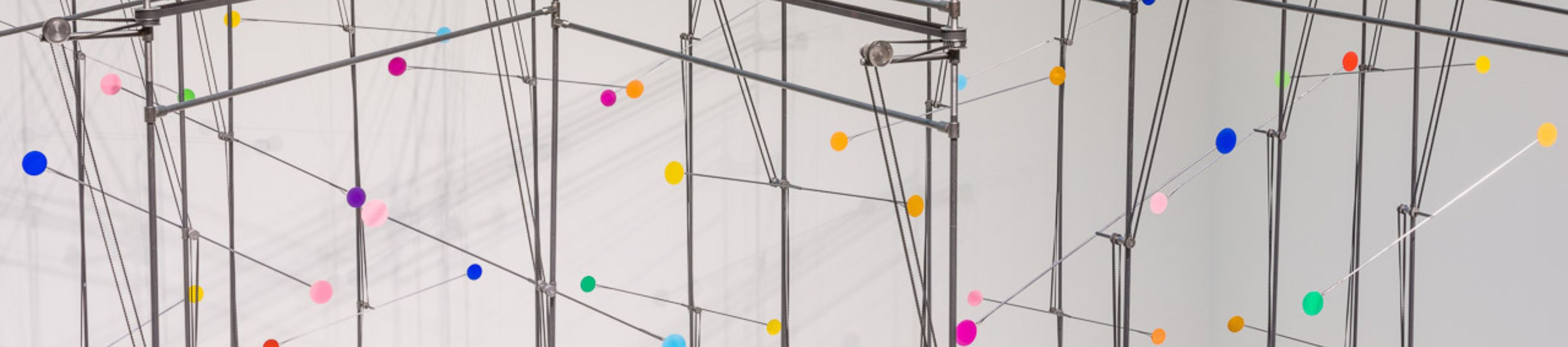 detail of Project Atrium: Juan Fontanive, which featured a hanging kinetic sculpture with colored dots on rods
