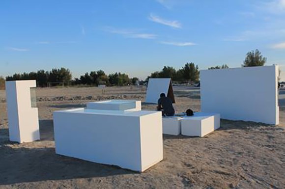 white cube in the desert by Khalid Albaih