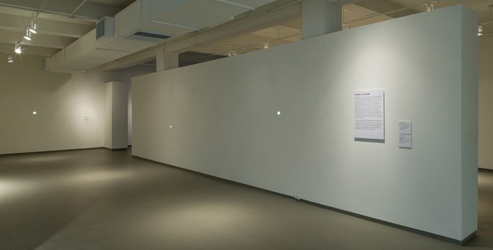 exhibit wall for Smoke and Mirrors
