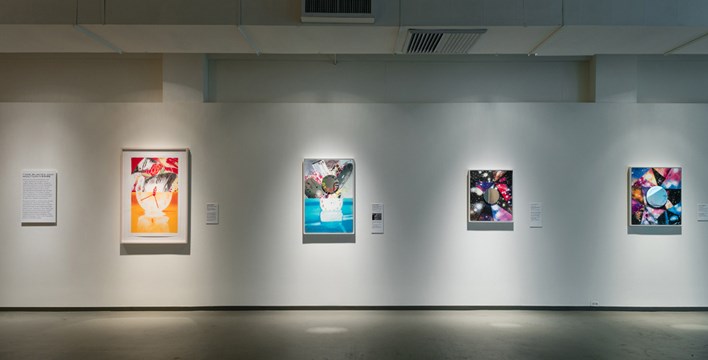 a view of four artworks on a wall