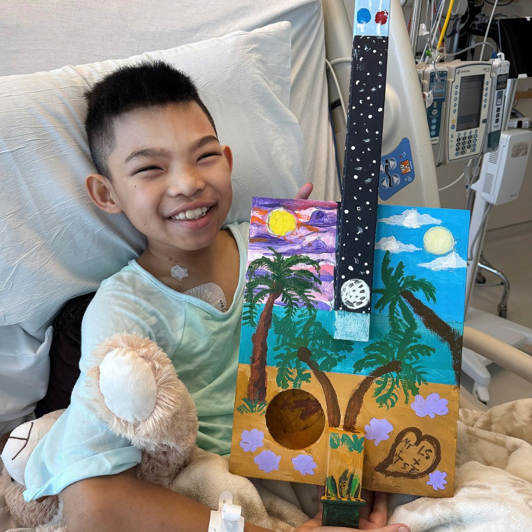 Art with a Heart patient Madden with his work