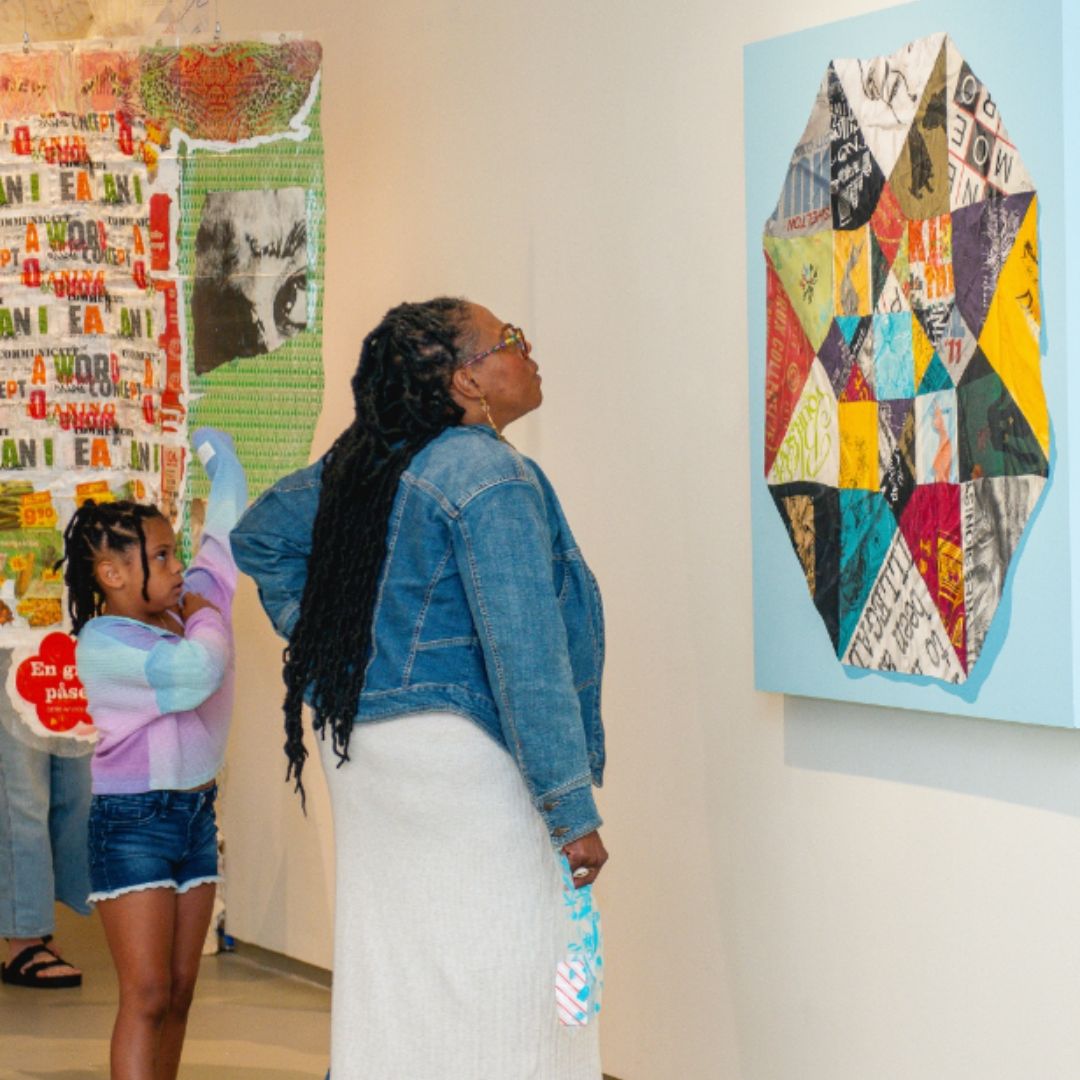 a family looking at art in a MOCA gallery