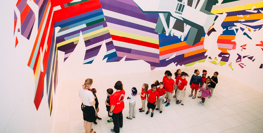 students on a tour of the gallery