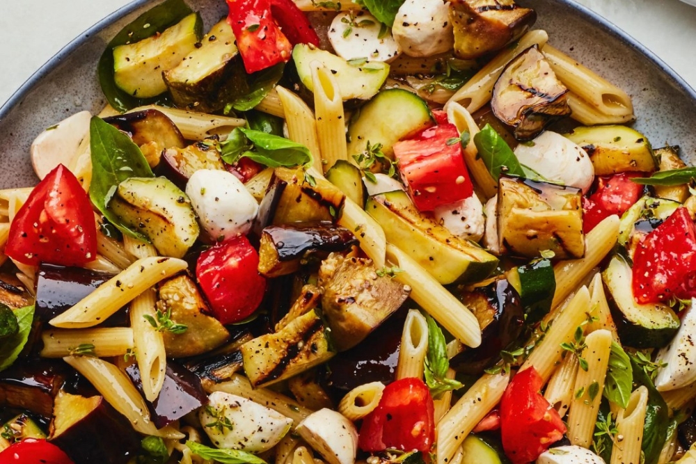 pasta salad with mozzarella, tomatoes, eggplant, and basil